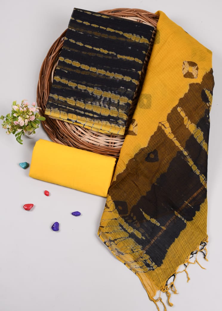 Charming yellow Kota Doriya suit with black dupatta. Includes cotton bottom. Perfect for traditional occasions & gifting.